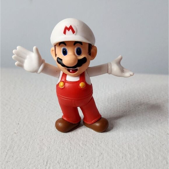 FIRE MARIO WORLD OF NINTENDO ACTION FIGURE SUPER BROS JAKKS PACIFIC LN 2.5" - Picture 1 of 4